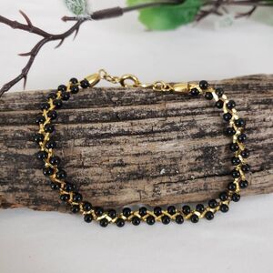 NWOT Trifari Black and Gold Beaded Braid Bracelet